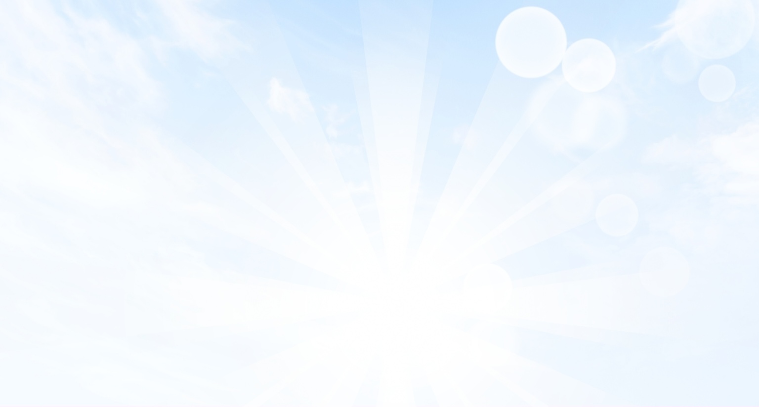 Heller blauer Himmel mit Sonnenstrahlen und Bokeh-Effekt-Lichtkreisen.